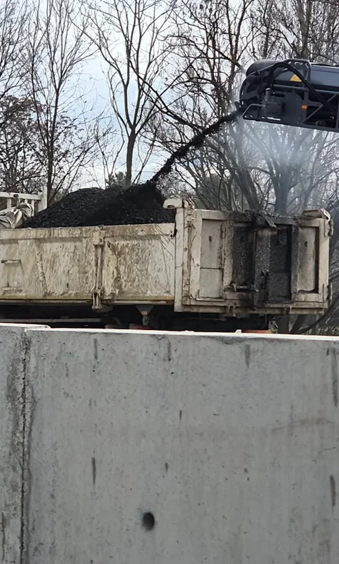 Side shot of road pavement milling and asphalt removal Stock-Footage 343755747
