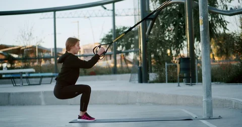 Side shot of strong diligent female doing fitness training for powerful leg Stock Footage 123663266