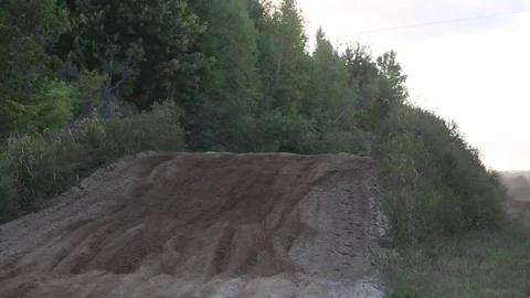 Side by side utv jump offroad vehicle gets airtime Stock Footage 71148697