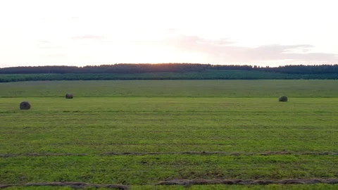 Side span over a harvested field. Stock Footage 114124741