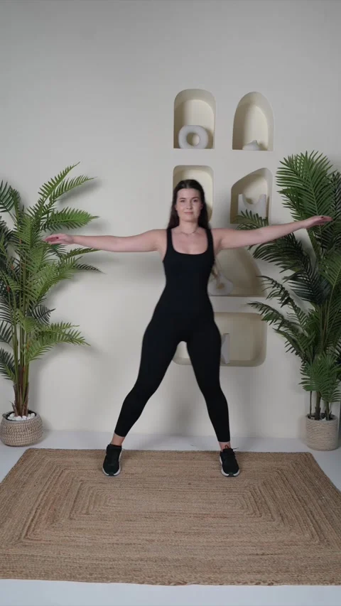 Side Steps with Arm Raises Stock Footage 314187416