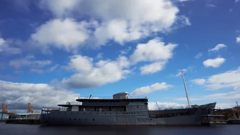 Side on Timelapse of large boat waiting to undergo repairs at Leith Docks Stock Footage 77660072