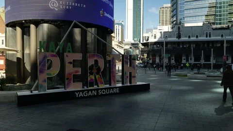 Side track shot Perth sign and Australians crossing road 6K Stock Footage 311991609