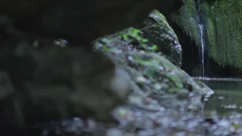 Side tracking on the creek falls, moving shot on the river waterfalls Video stock 83043276