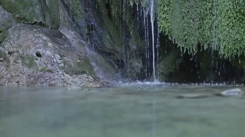 Side tracking on the creek falls, water surface Stock-Footage 83043433