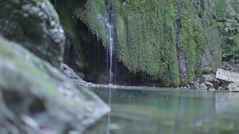 Side tracking down to up on the creek falls Video stock 83043523