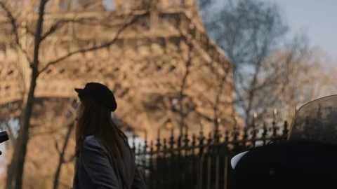Side tracking shot of happy elegant tourist woman walking along Paris street Stock Footage 121330882