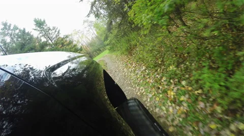 Side of Truck Driving Back Road POV Stock Footage