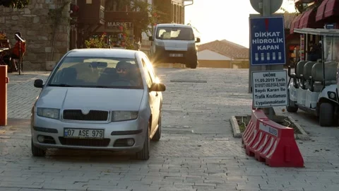 Side, Turkey - CIRCA 2022: gray Skoda Fabia in city of Side drive along Stock Footage 224615700