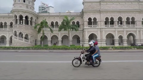 Side vehicle shot, Sultan Abdul Samad Building, Kuala Lumpur, Malaysia 動画素材 225651445