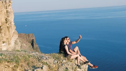 Side view active tourist couple posing taking selfie using smartphone Stock-Footage 93216012