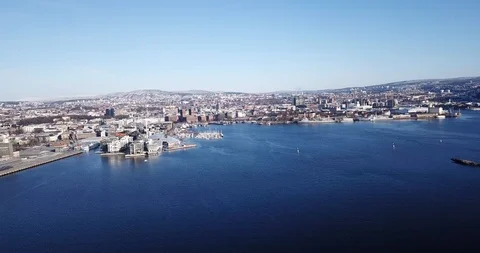 Side view aerial shot of Aker Brygge and Akershus in Oslo, Norway Stock Footage 85866740