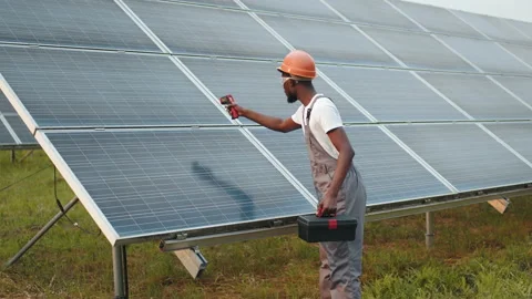 Side view of african american man standing outdoors and measuring heat of solar Stock Footage 168688237