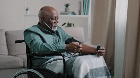 Side view African old 60s male ill senior retired bald man with gray beard Stock Footage 202593437