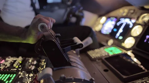 Side view of airline pilot's hand pushing throttle 4K Stock Footage 53131095