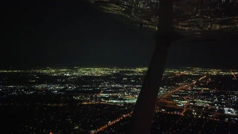 Side View Airplane Aerial View City Skyscrapers With Airplane Wing Tips Refl Stock Footage 164883291