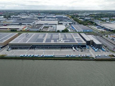 Side view Albert Heijn distribution center for online orders with delivery vans Foto stock