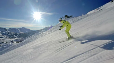 Side view alpine skier skiing in short swings Stock Footage