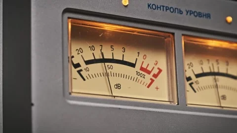 Side View of Analog VU Meters on Retro Audio Device Stock Footage 303993987