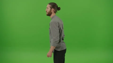 Side View. Angry Young Bearded Freelancer Student Man Emotionally Explaining Stock Footage 220464681