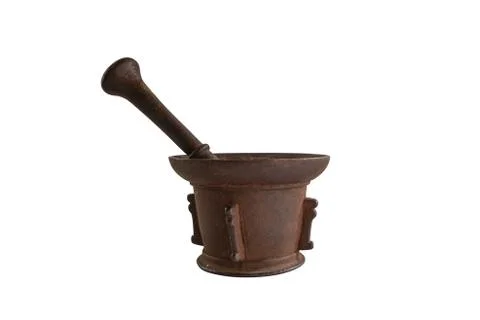 Side view of an antique, rusty and aged pestle and mortar isolated on white Stock Photos