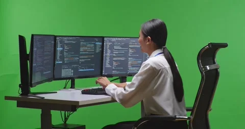 Side View Of Asian Woman Developer Using Computer To Write Code Stock Footage 231160031