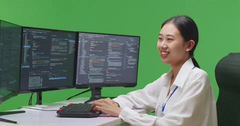 Side View Of Asian Woman Developer Crossing Arms And Smiling To Camera While Stock Footage 231171143
