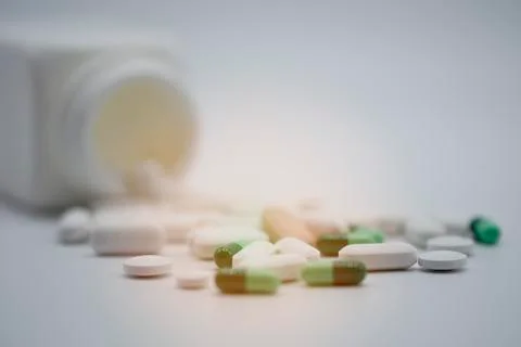 Side view of assorted Pharmaceutical medicine pills, capsules Stock Photos