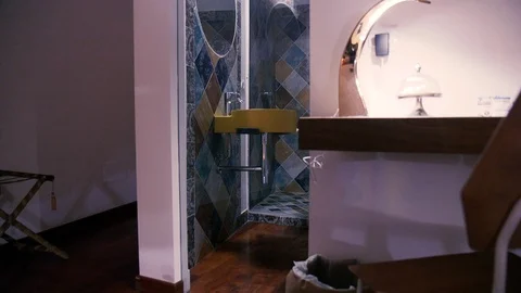 Side view of the bathroom with sink and mirror Stock Footage 86171537