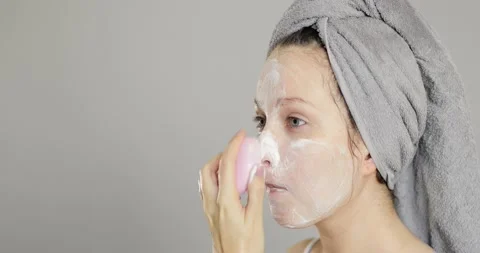 Side view of beautiful charming young girl with towel Stock Footage 151262173