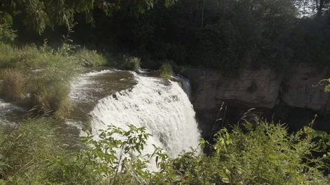 Side view of a beautiful waterfall in the forest. Stock Footage 78954012