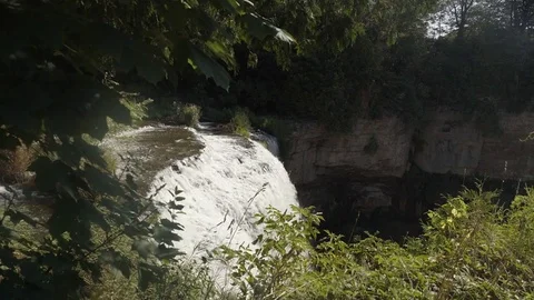 Side view of a beautiful waterfall in the forest. Stock Footage 78954306