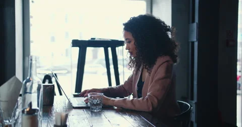 Side view beautiful young multiethnic female student working online, e-learning Stock Footage 144226477