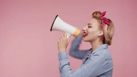 Side view of beautiful young retro woman Screaming in megaphone turn around Stock Footage 164132715