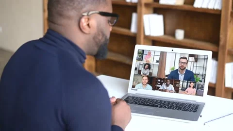 Side view of black businessman talking to his colleagues Stock Footage 152777996