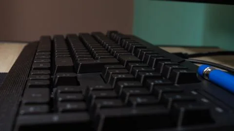 Side view of a black desktop keyboard. Intro and sift and delete key. Stock Photos