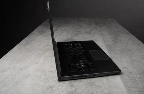Side view of black laptop computer Stock Photos