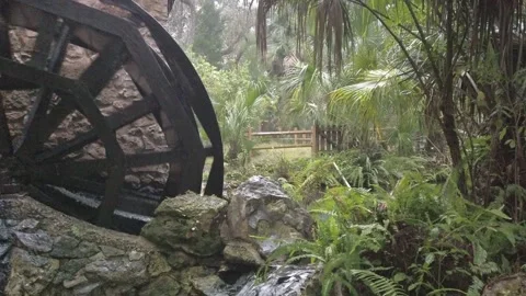 Side View of Black water mill and stone foundation. Stock Footage 256047018
