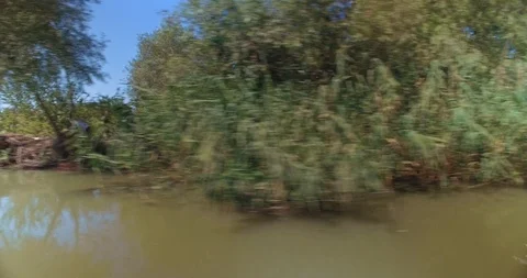 Side view from boat riding in Danube river canal at city of Vilkovo, Ukraine Stock Footage 105035774