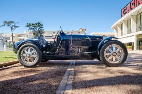 Side view of boat tail shaped vintage Bugatti Type 35 race car on sunny day Stock Photos