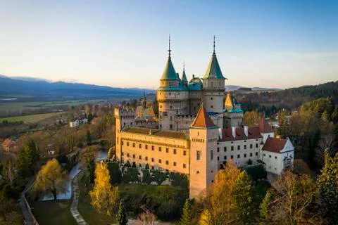 Side view of Bojnice castle with one wall bathed in lovely morning light. Stock Photos