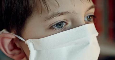 Side view of boys face wearing protection mask. Stock Footage 126787809