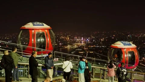 Side view of a Bubble Tram car on Canton Tower,night 4K Video stock 304679485