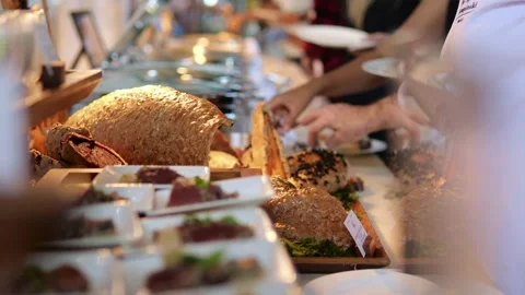 Side view of the buffet table in the hotel. Guests of the hotel came to dinner Stock Footage 220106517