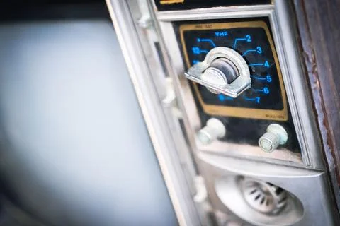 Side view of the on-off button of a retro vintage TV Stock Photos