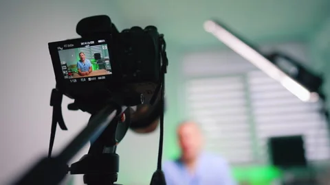 Side View Of Camera Filming Doctor In Clinic Stock Footage 333651406