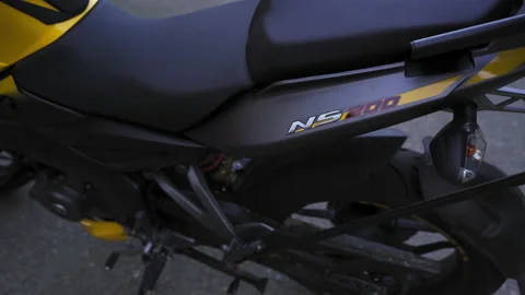 Side view camera slide Bajaj NS200 Pulsar motorcycle steering wheel with Vídeo Stock 134266769