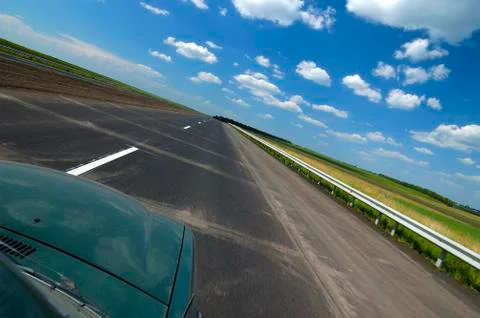 Side view of a car view is a smooth highway Stock Photos