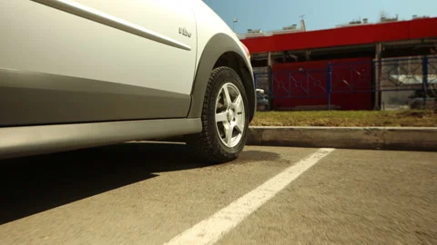 Side view of car wheel before replacement Stock Footage 130510066