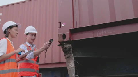 Side view of cargo container workers go to trunk of truck and scan barcode Stock-Footage 146470986